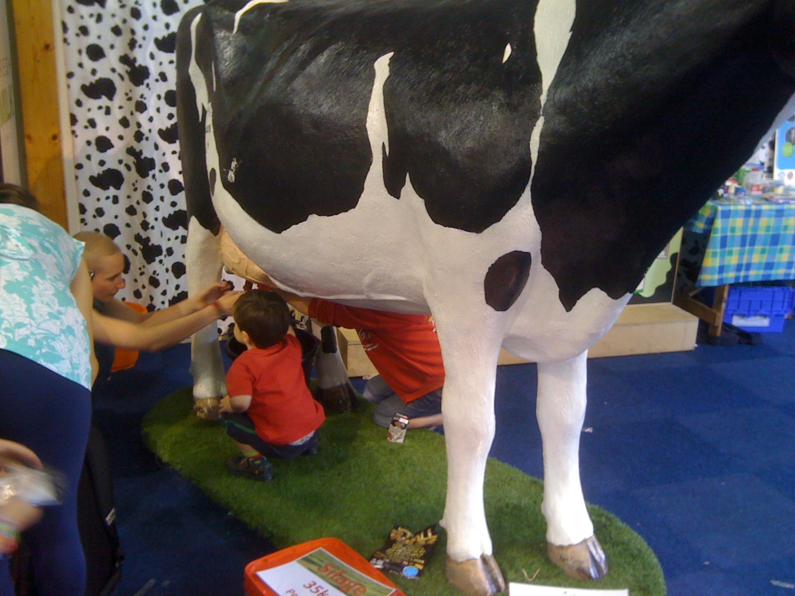 Kids Milking the Model Cow