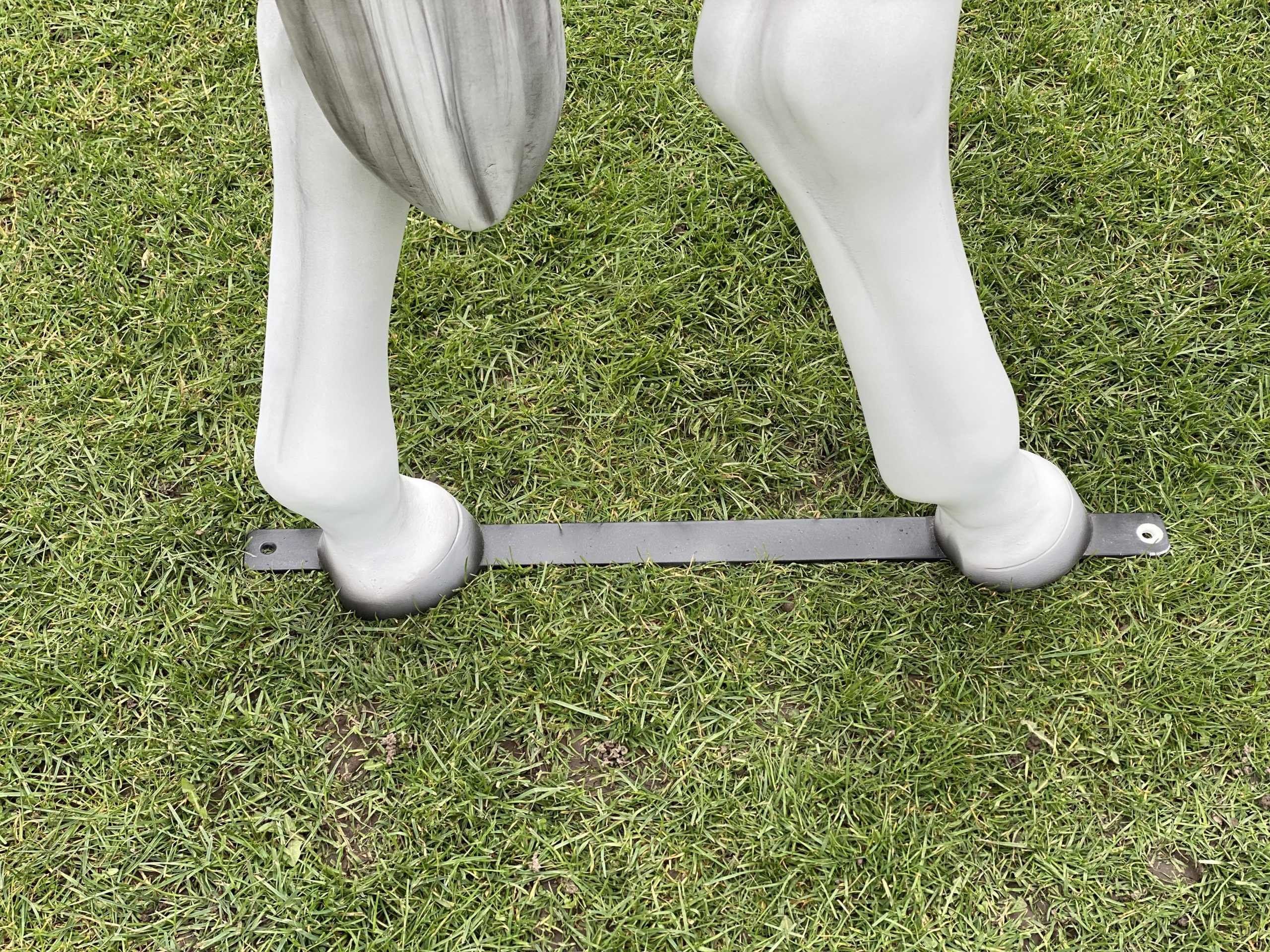 Grey life‑size fibreglass riding pony model standing in a natural pose.
