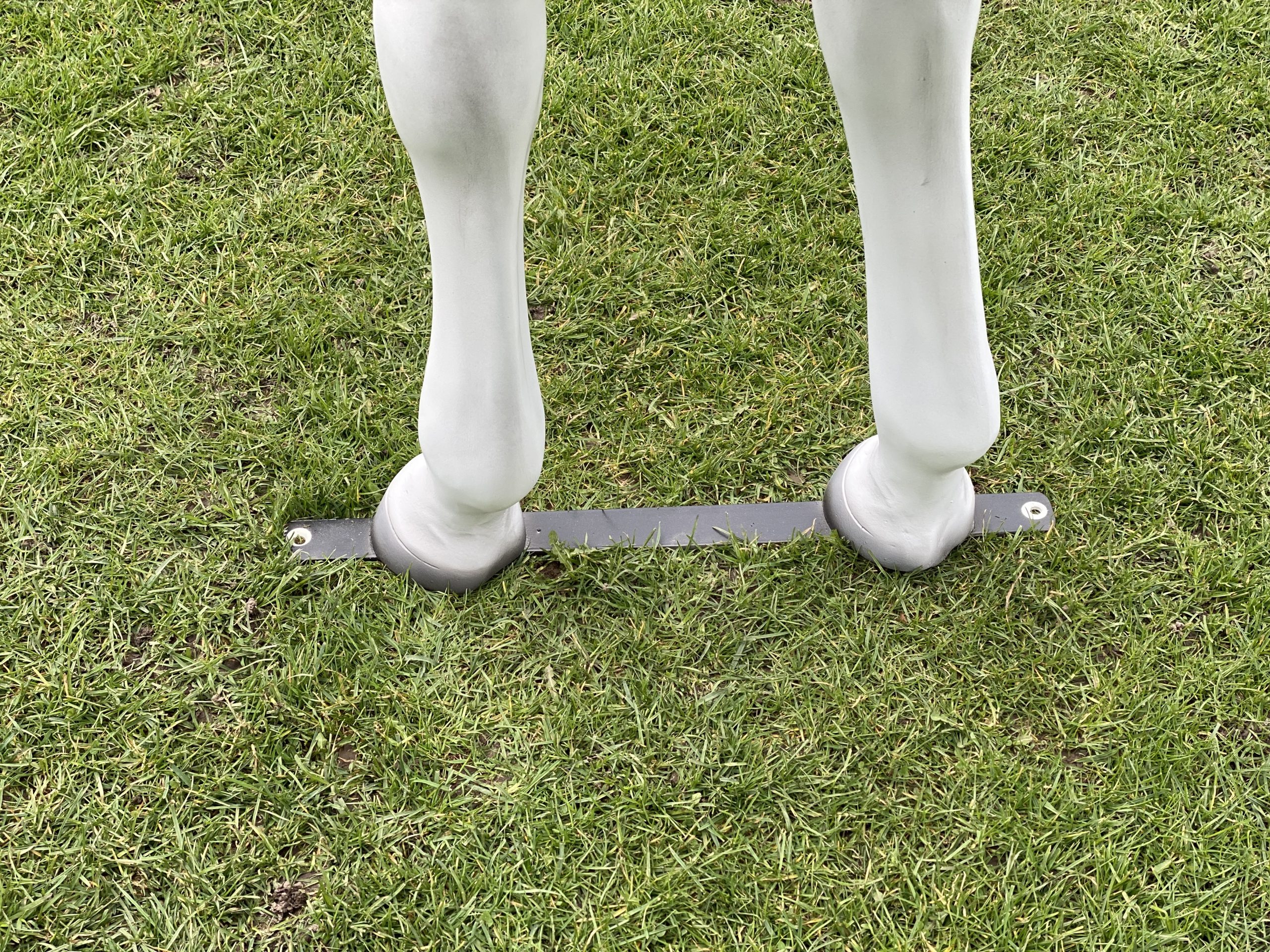 Grey life‑size fibreglass riding pony model standing in a natural pose.